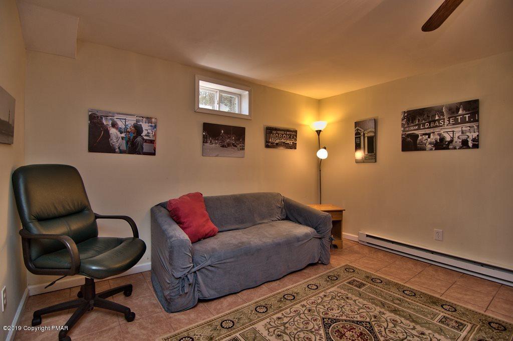 128 Bowman Road Mount Pocono, PA 18344 - Photo 36 of 43 Family Room view 2