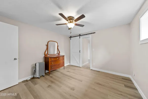 a view of workspace with wooden floor