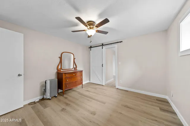 a view of workspace with wooden floor
