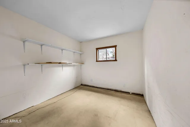 a view of a room with an empty space