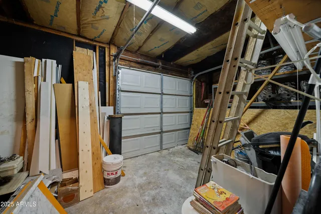 a view of walk in closet with wooden floor