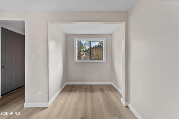 an empty room with a window