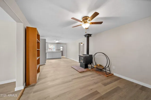a view of a room with a chandelier and a window