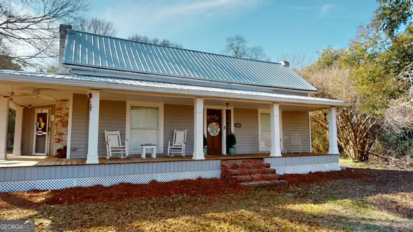 a view of a house with a porch