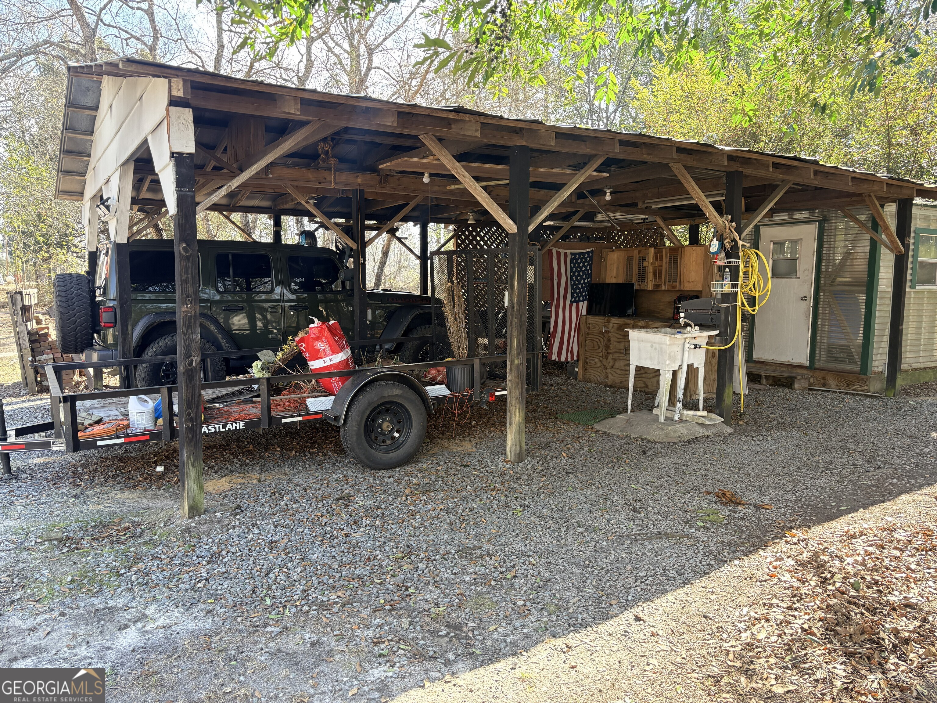 53 Summertown Main Street Midville, GA 30441 - Photo 48 of 57 a view of a car parked in a yard
