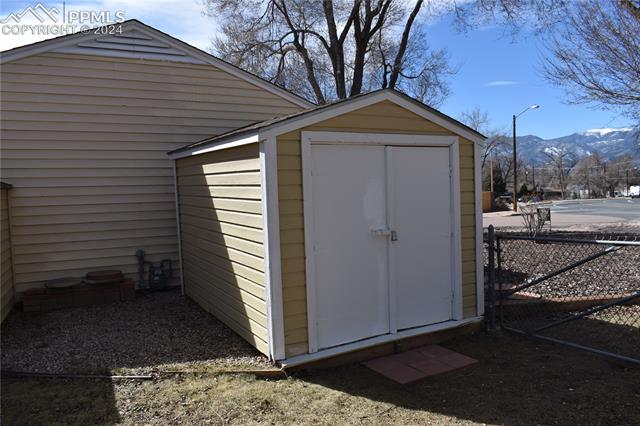 517 Erie Road Colorado Springs, CO 80910 - Photo 13 of 14 View of shed / structure with a mountain view