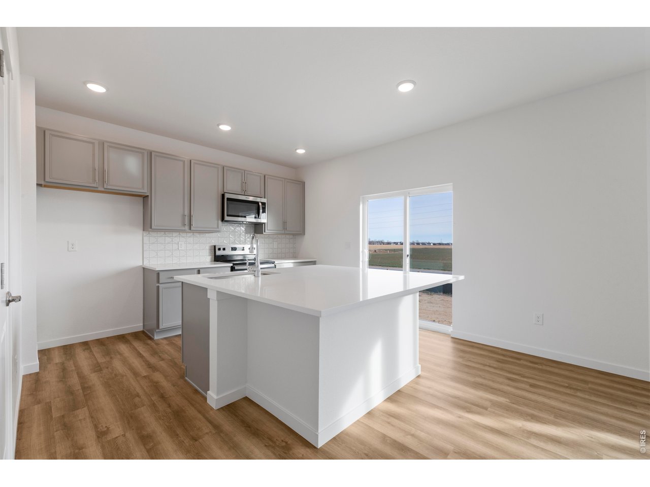 677 Muturu Road Johnstown, CO 80534 - Photo 9 of 35 Large kitchen island
