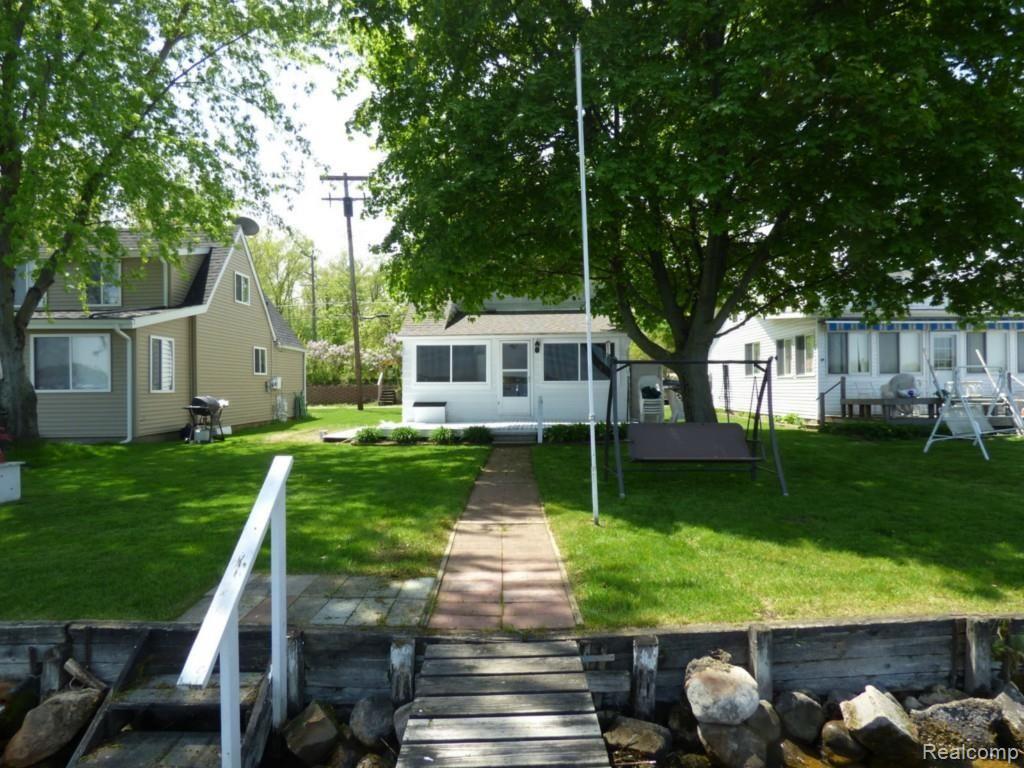 9352 Dexter-Pinckney Road Pinckney, MI 48169 - Photo 26 of 27 25 FRONT FROM DOCK.jpg