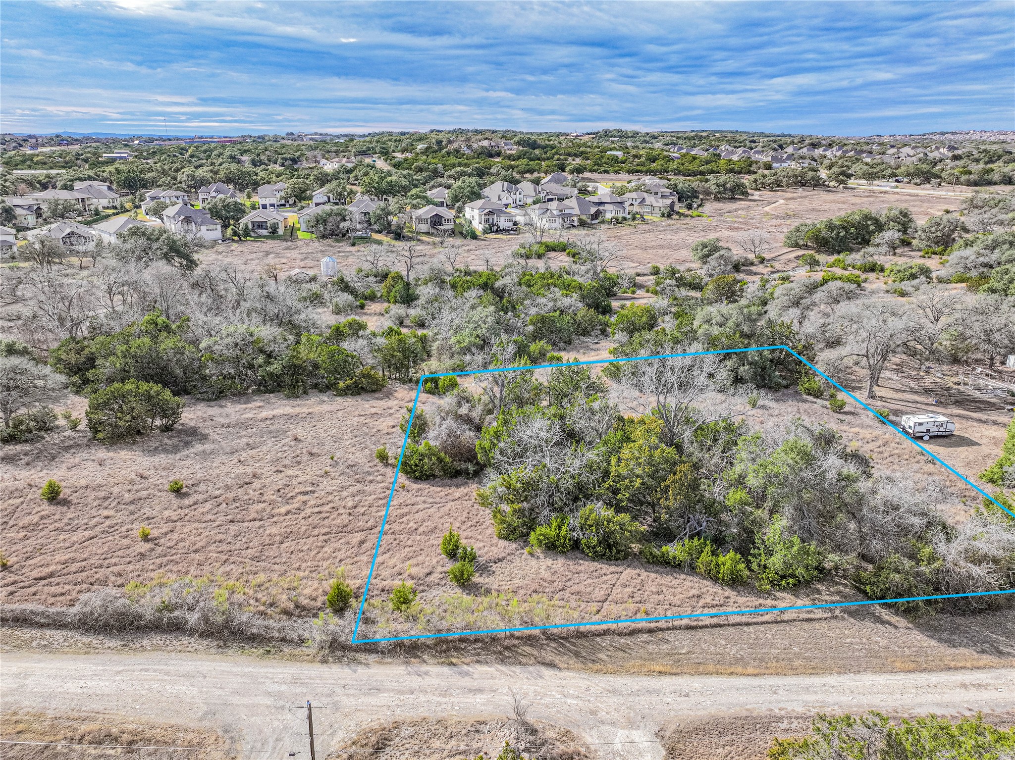 Tbd Lot 2 Tbd Road Austin, TX 78737 - Photo 2 of 18 Aerial perspective of suburban area featuring property parcel outlined