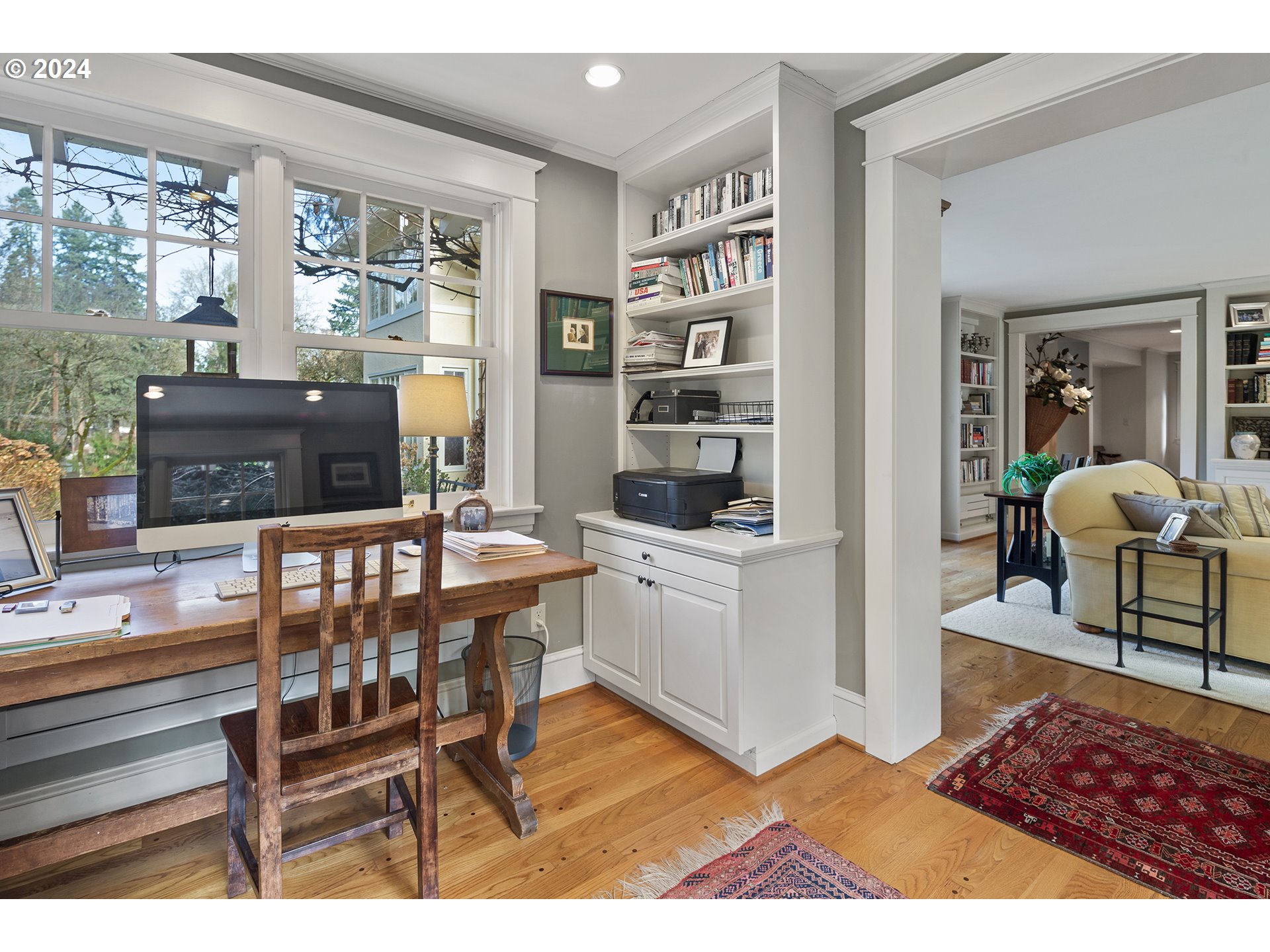 1803 South Riverdale Road Portland, OR 97219 - Photo 11 of 48 a living room with furniture a rug and a table