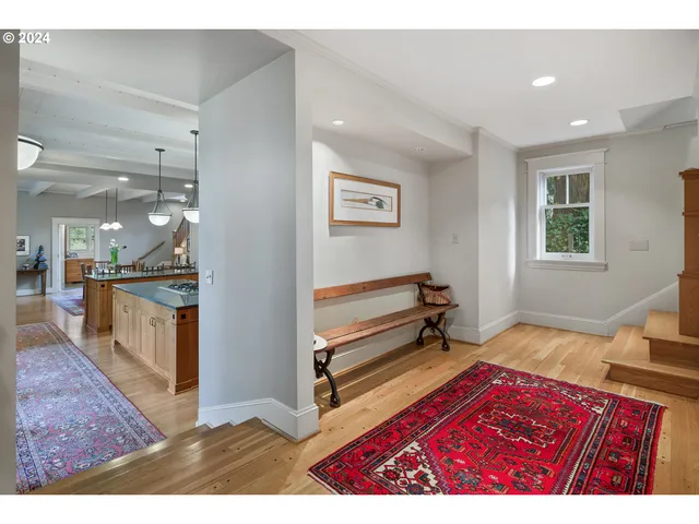 a kitchen that has a lot of cabinets in it