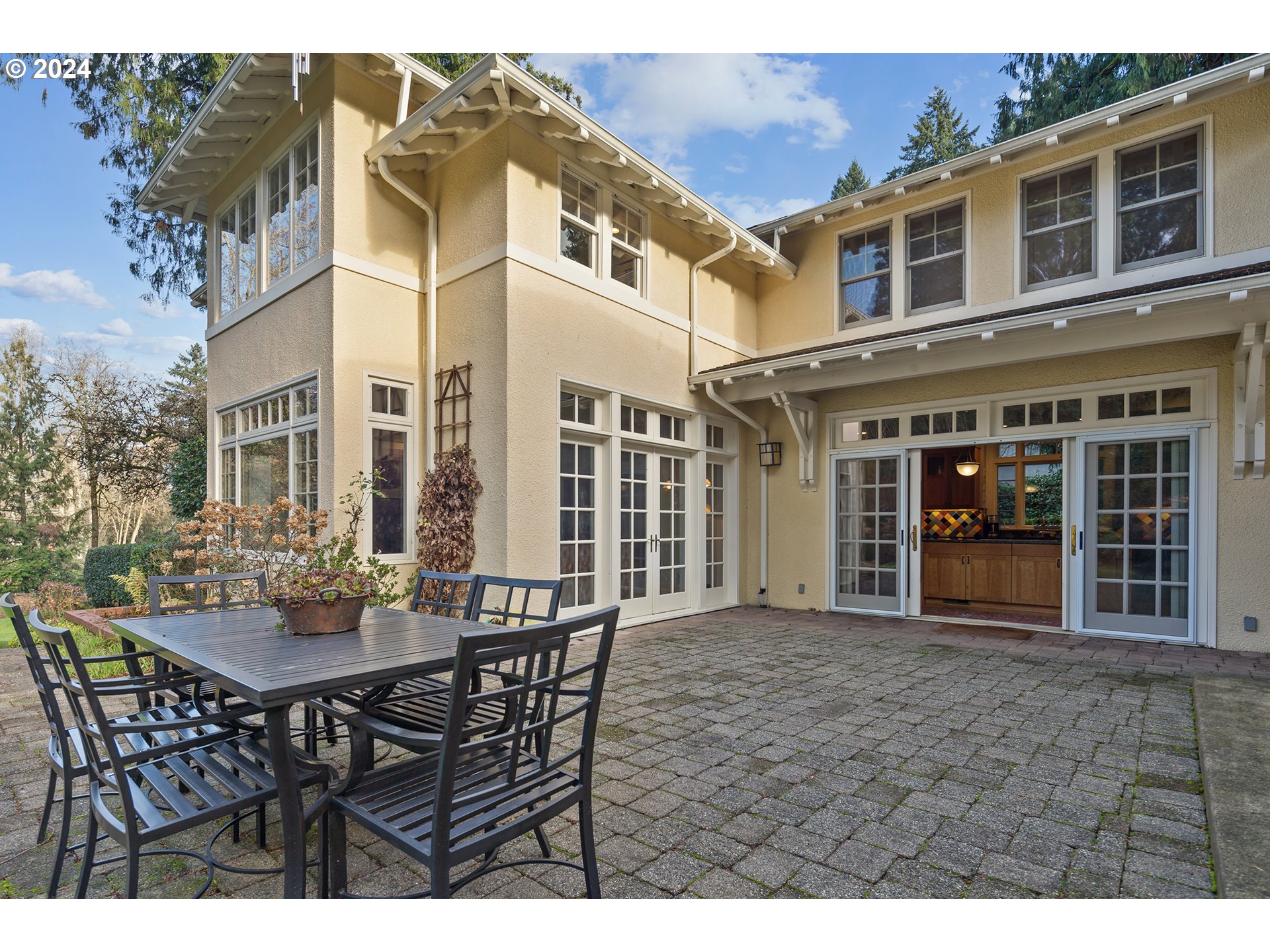 1803 South Riverdale Road Portland, OR 97219 - Photo 21 of 48 a view of a building with a dining table and chairs