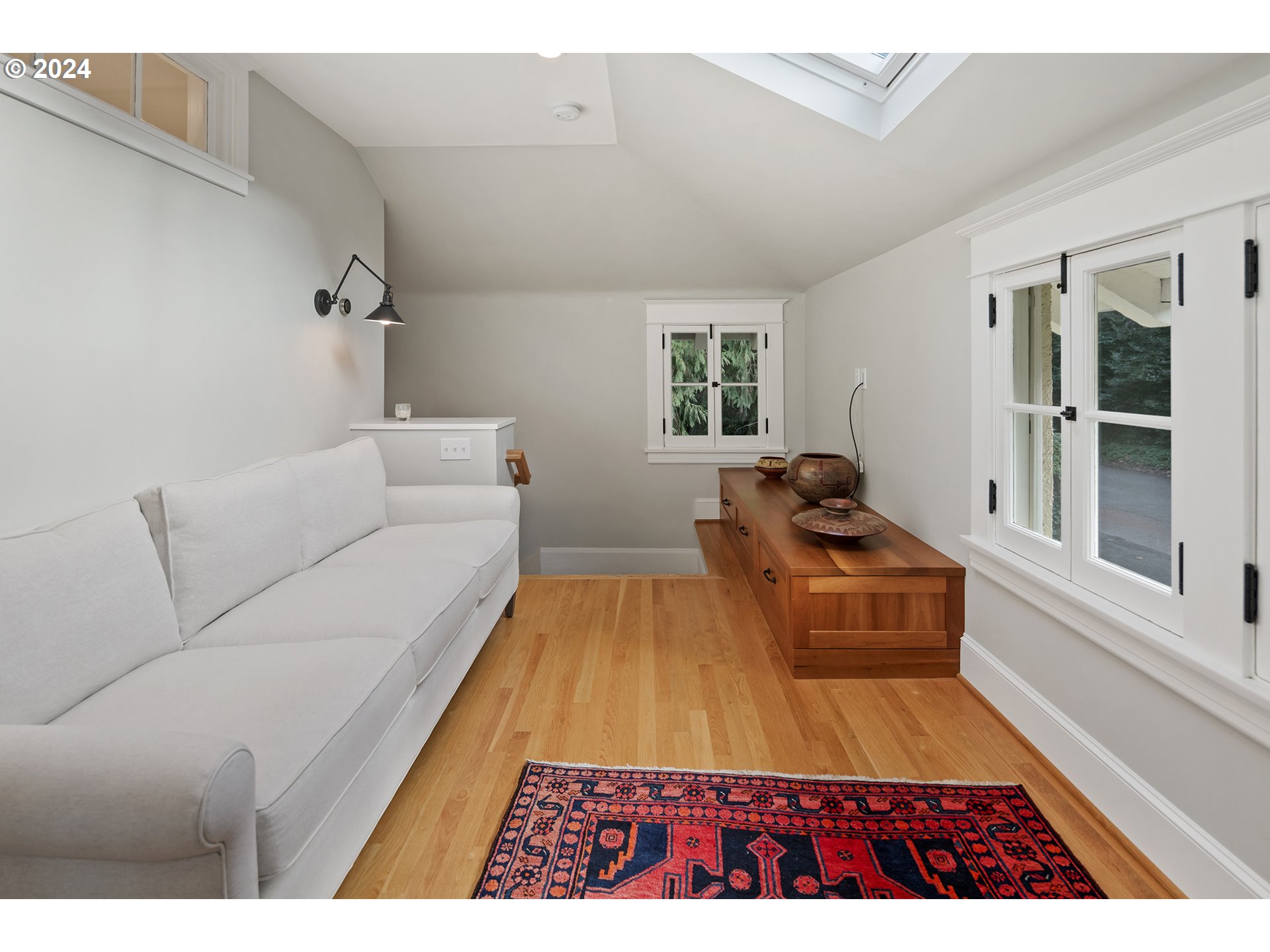 1803 South Riverdale Road Portland, OR 97219 - Photo 35 of 48 a living room with furniture and a rug