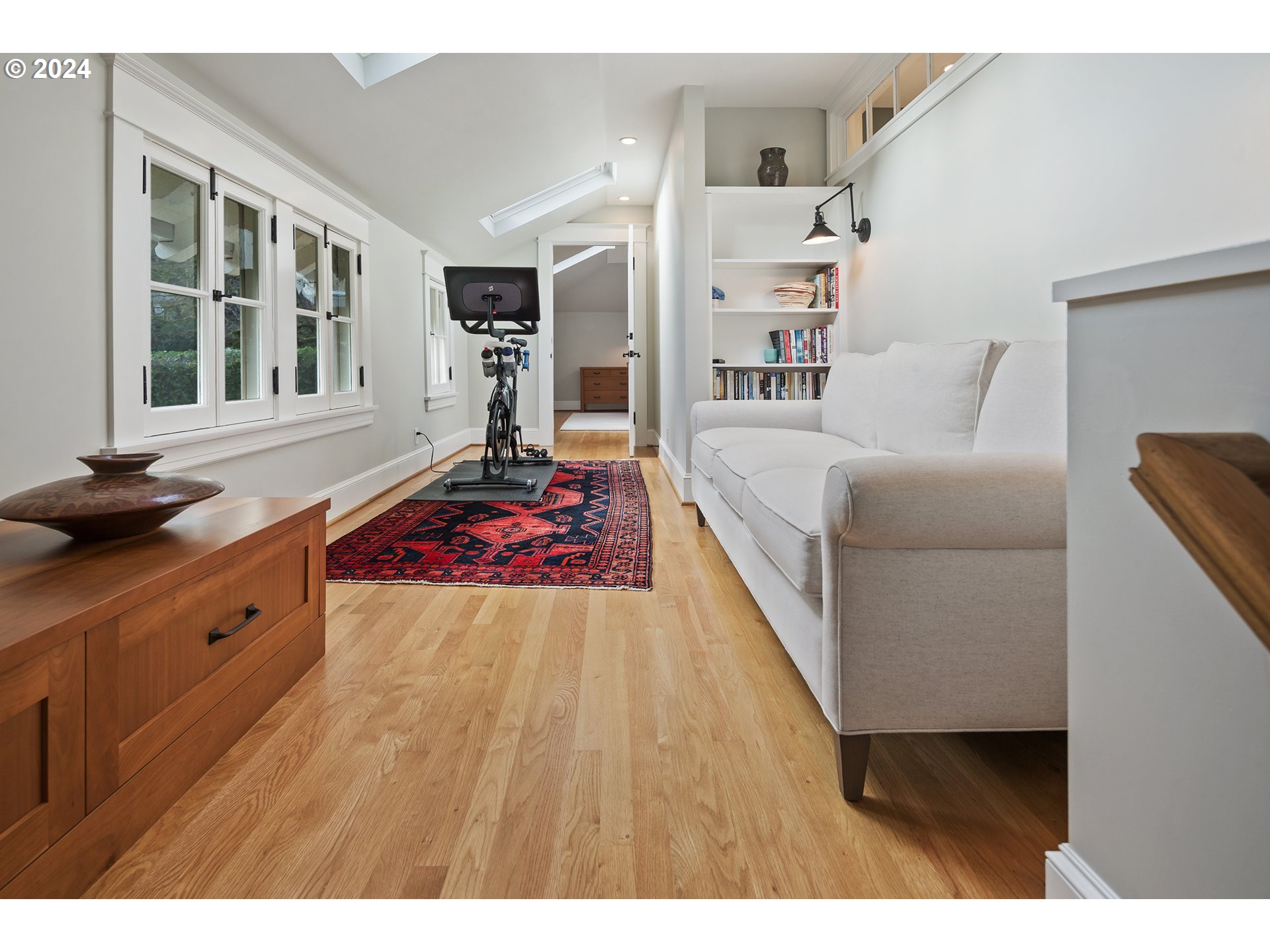 1803 South Riverdale Road Portland, OR 97219 - Photo 36 of 48 a living room with furniture and a wooden floor