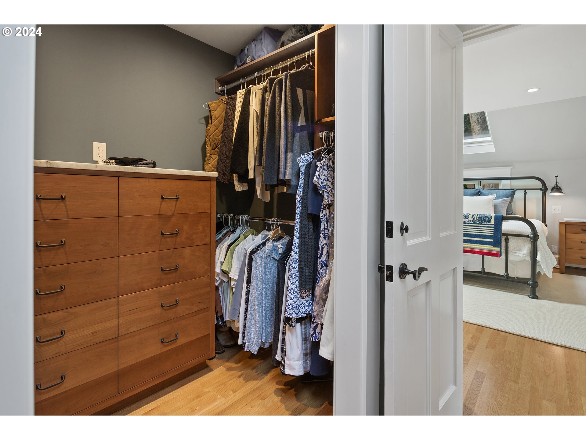 1803 South Riverdale Road Portland, OR 97219 - Photo 41 of 48 a view of walk in closet with clothes