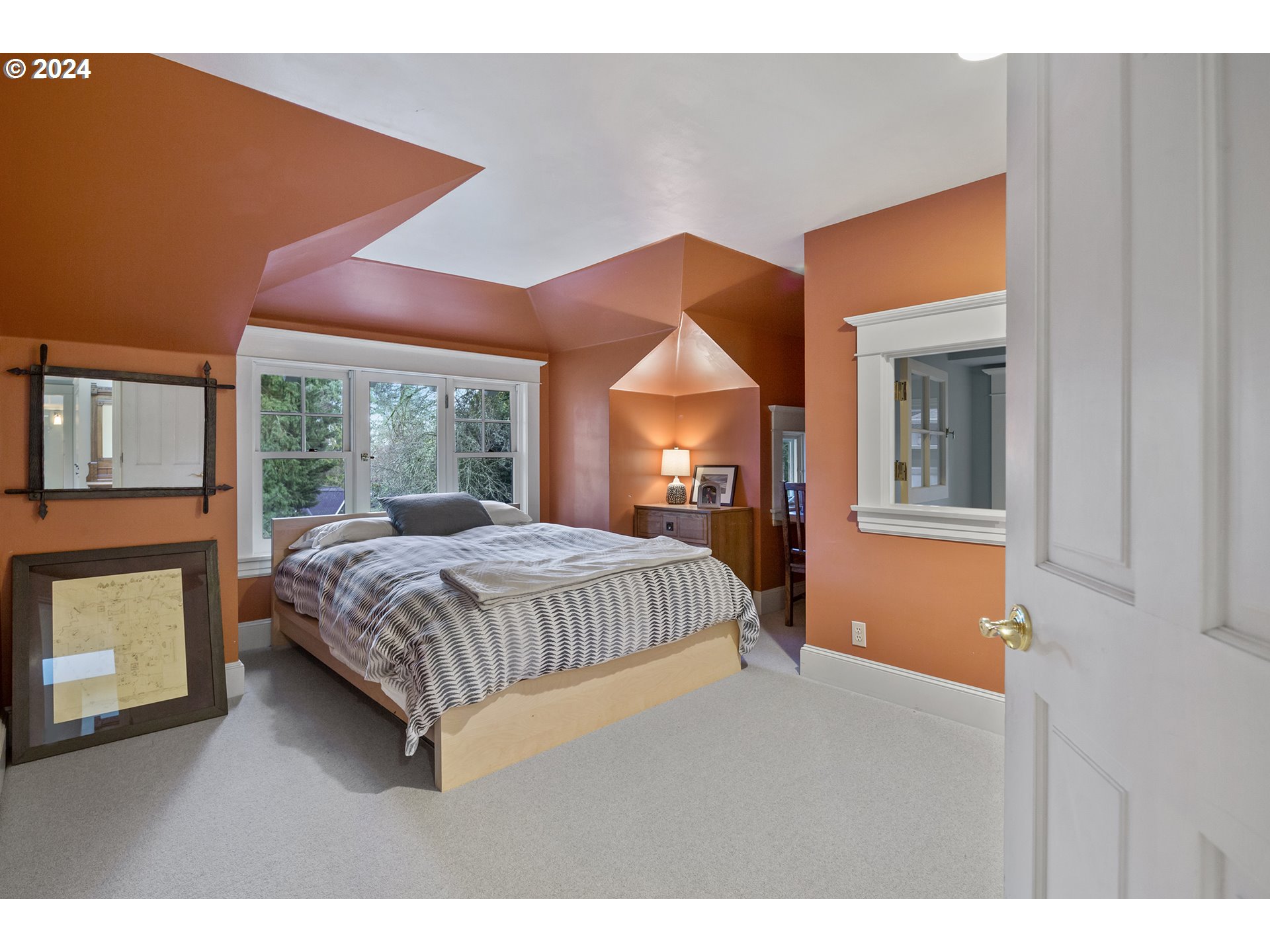 1803 South Riverdale Road Portland, OR 97219 - Photo 43 of 48 a bedroom with a bed and a window