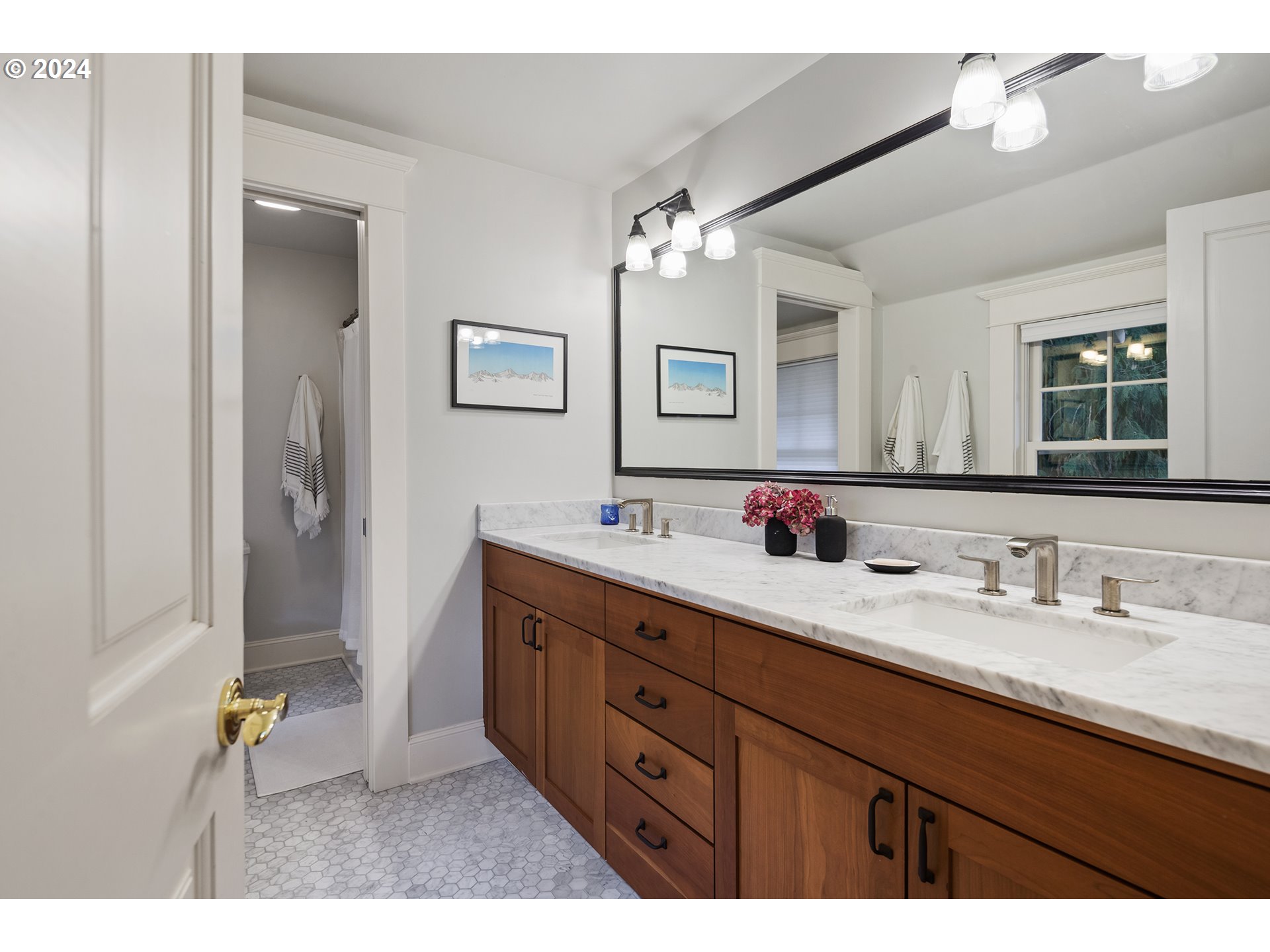 1803 South Riverdale Road Portland, OR 97219 - Photo 44 of 48 a bathroom with a double vanity sink and a mirror