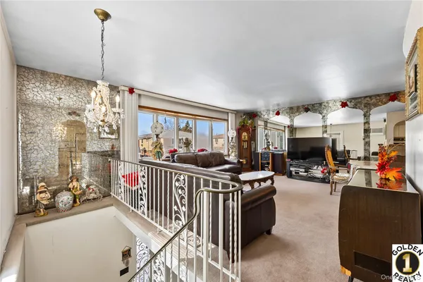 a view of a living room and dining room