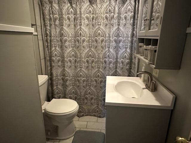 1555 Rich Road Savannah, TN 38372 - Photo 7 of 18 Full bathroom with a shower with curtain, toilet, vanity, and tile patterned flooring