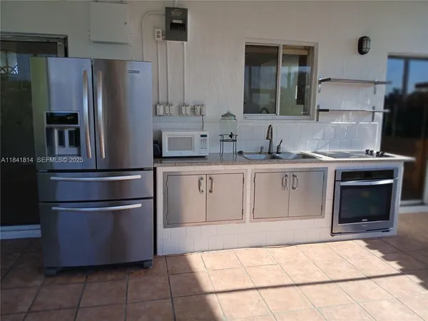 $660,000 | 7467 Northwest 169th Lane, Hialeah, FL 33015