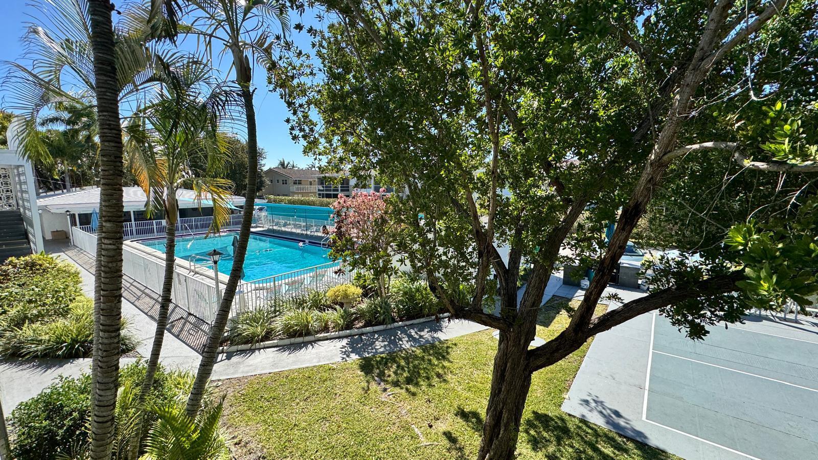 2151 Northeast 42nd Court, Unit 221 Lighthouse Point, FL 33064 - Photo 25 of 31 Pool