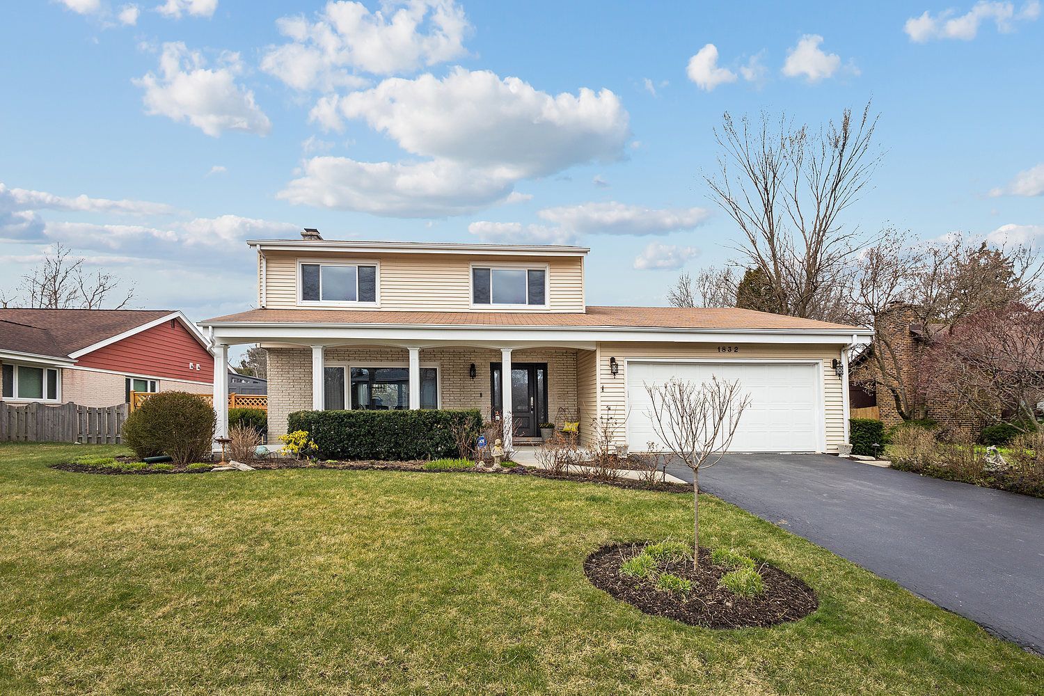 1832 Birch Road Northbrook, IL 60062 - Photo 2 of 28 a front view of a house with garden