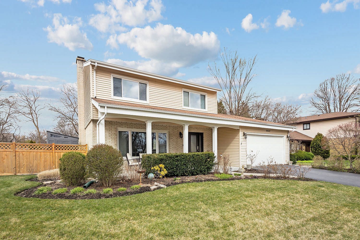 1832 Birch Road Northbrook, IL 60062 - Photo 3 of 28 a front view of a house with a yard