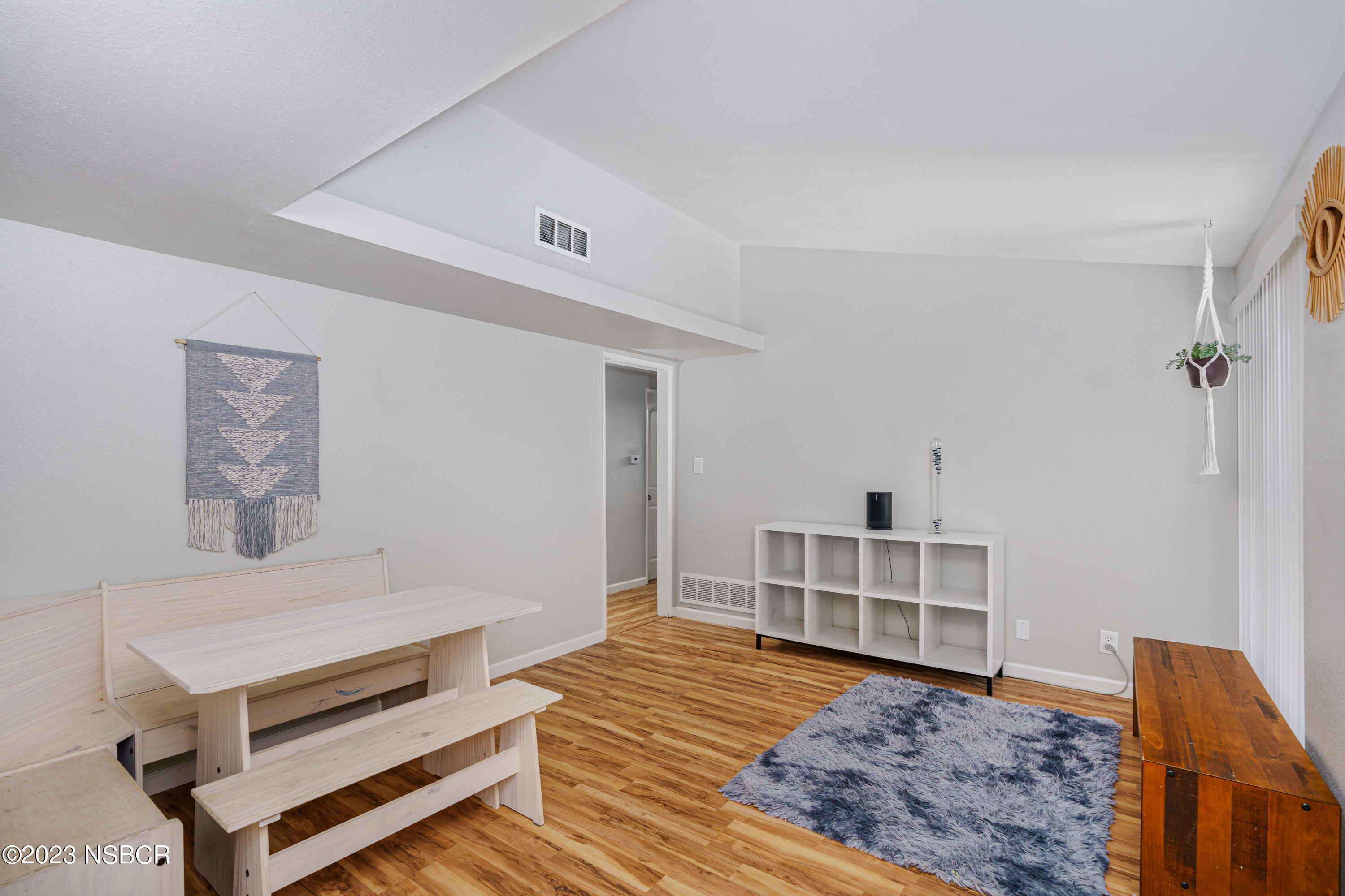 509 North Poppy Street Lompoc, CA 93436 - Photo 13 of 36 a bedroom with a bed and cabinets