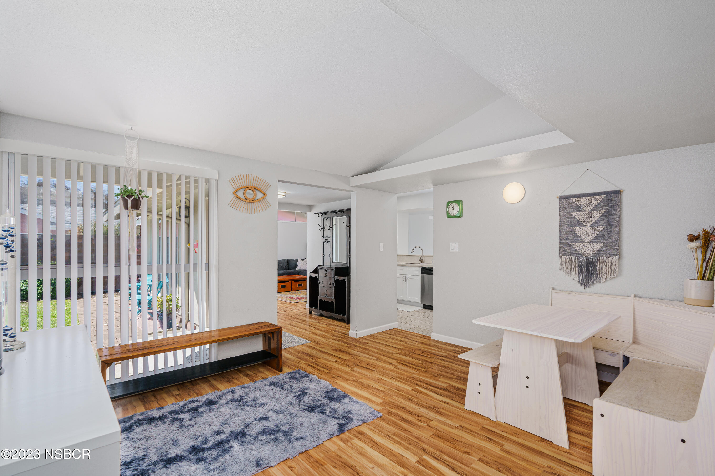 509 North Poppy Street Lompoc, CA 93436 - Photo 14 of 36 a spacious bedroom with a bed and a couch