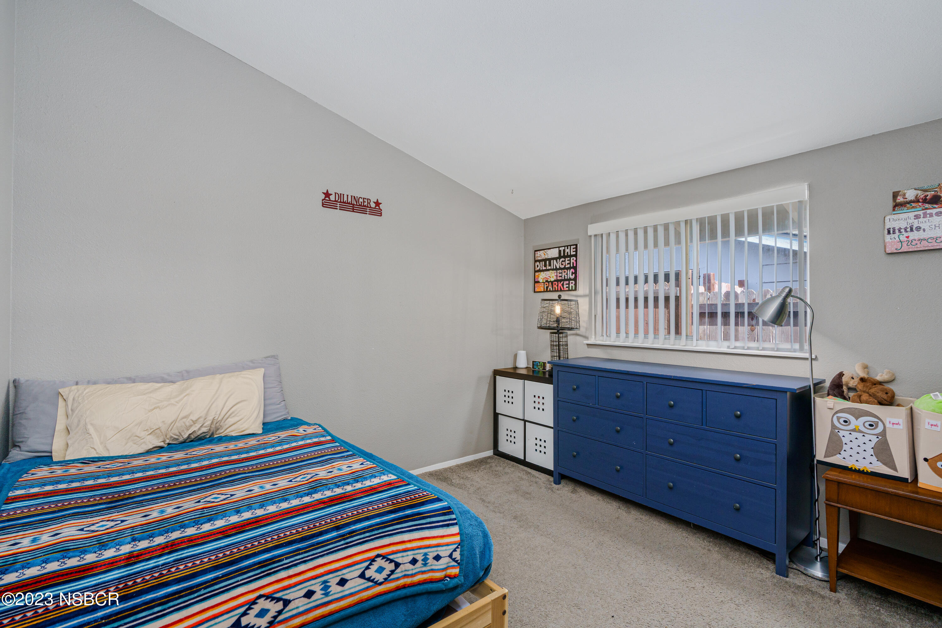 509 North Poppy Street Lompoc, CA 93436 - Photo 15 of 36 a bedroom with a bed and a window