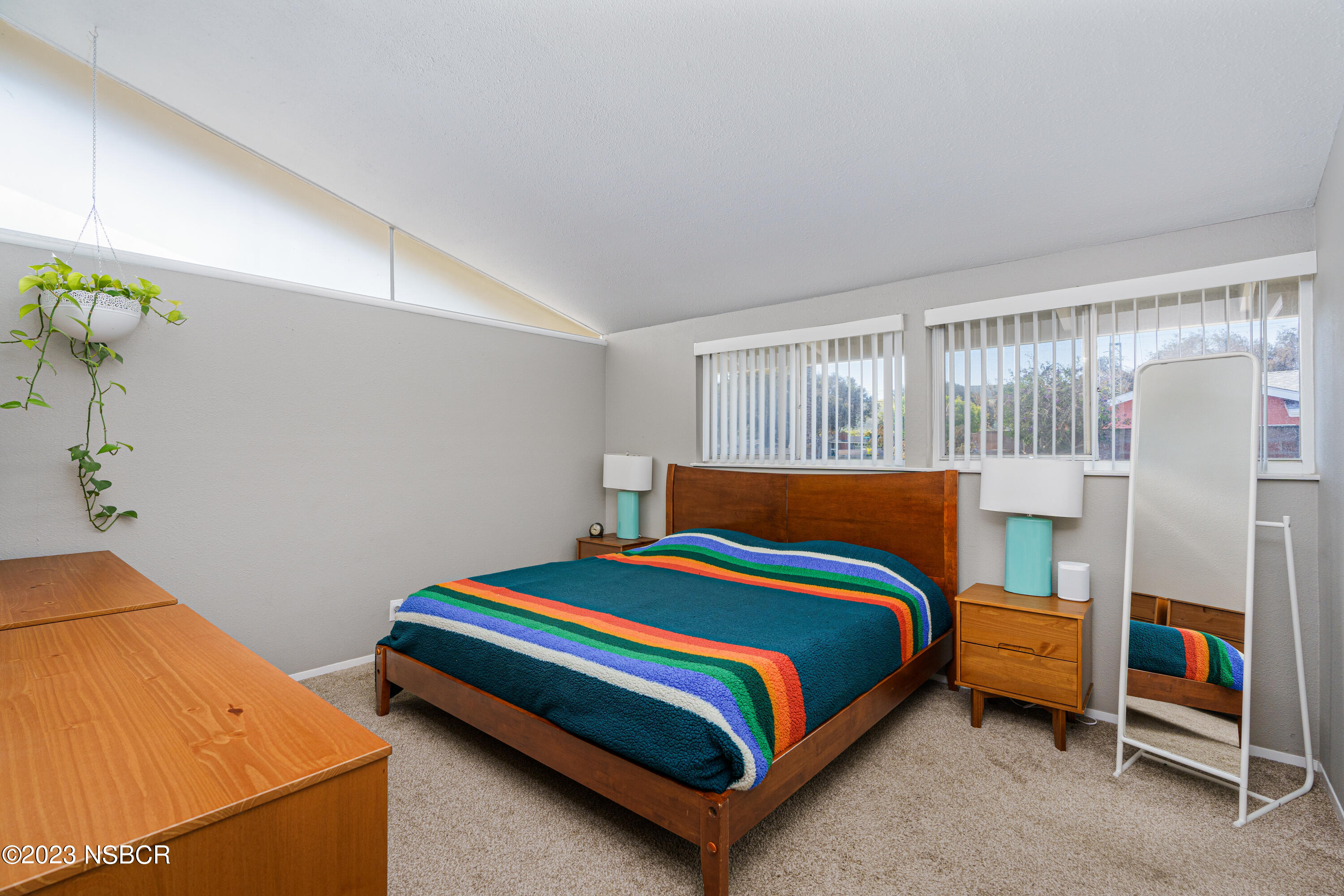 509 North Poppy Street Lompoc, CA 93436 - Photo 19 of 36 a bedroom with a bed and a window