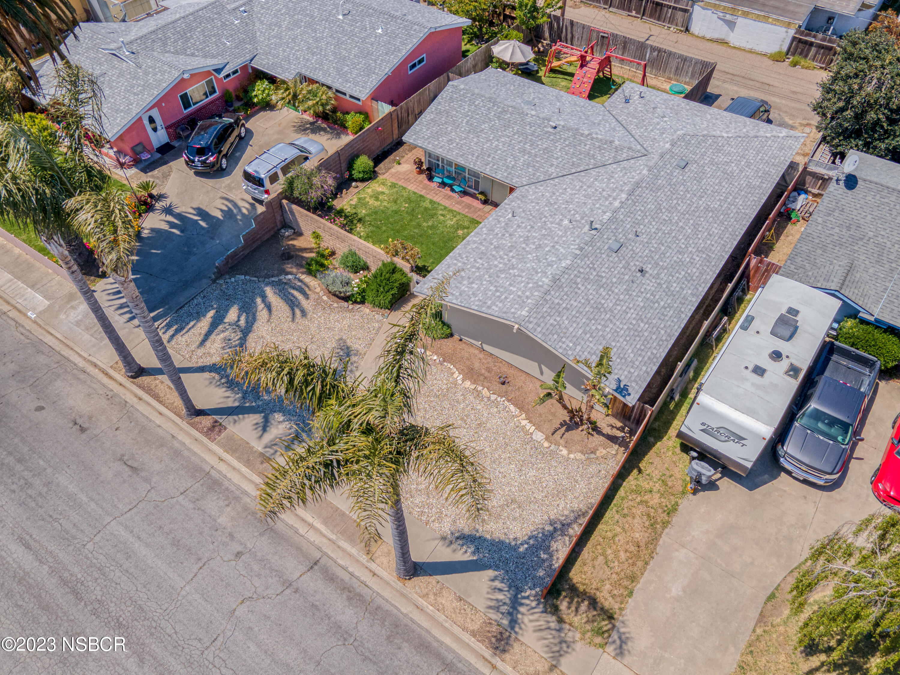 509 North Poppy Street Lompoc, CA 93436 - Photo 30 of 36 an aerial view of a house with a garden