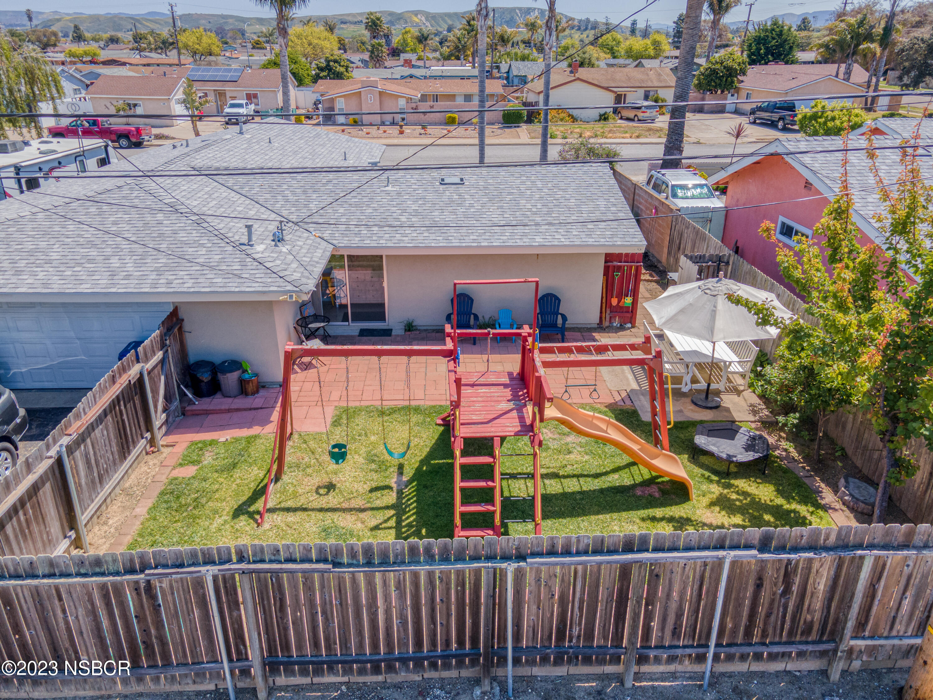509 North Poppy Street Lompoc, CA 93436 - Photo 35 of 36 an aerial view of a house with swimming pool outdoor seating