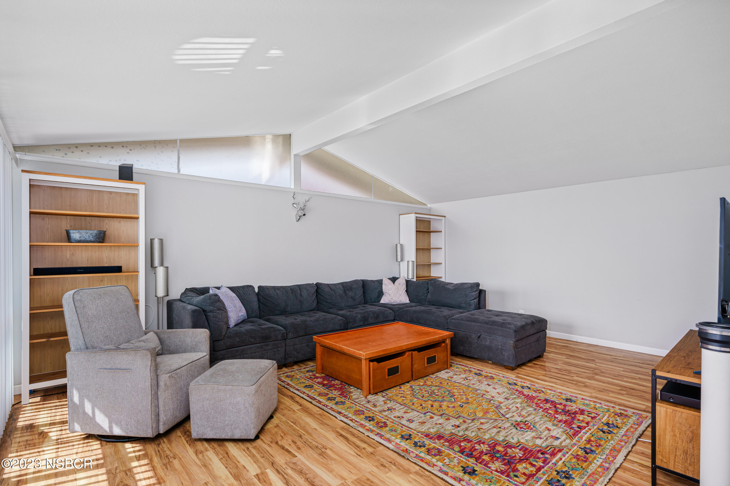 509 North Poppy Street Lompoc, CA 93436 - Photo 7 of 36 a living room with furniture and a rug