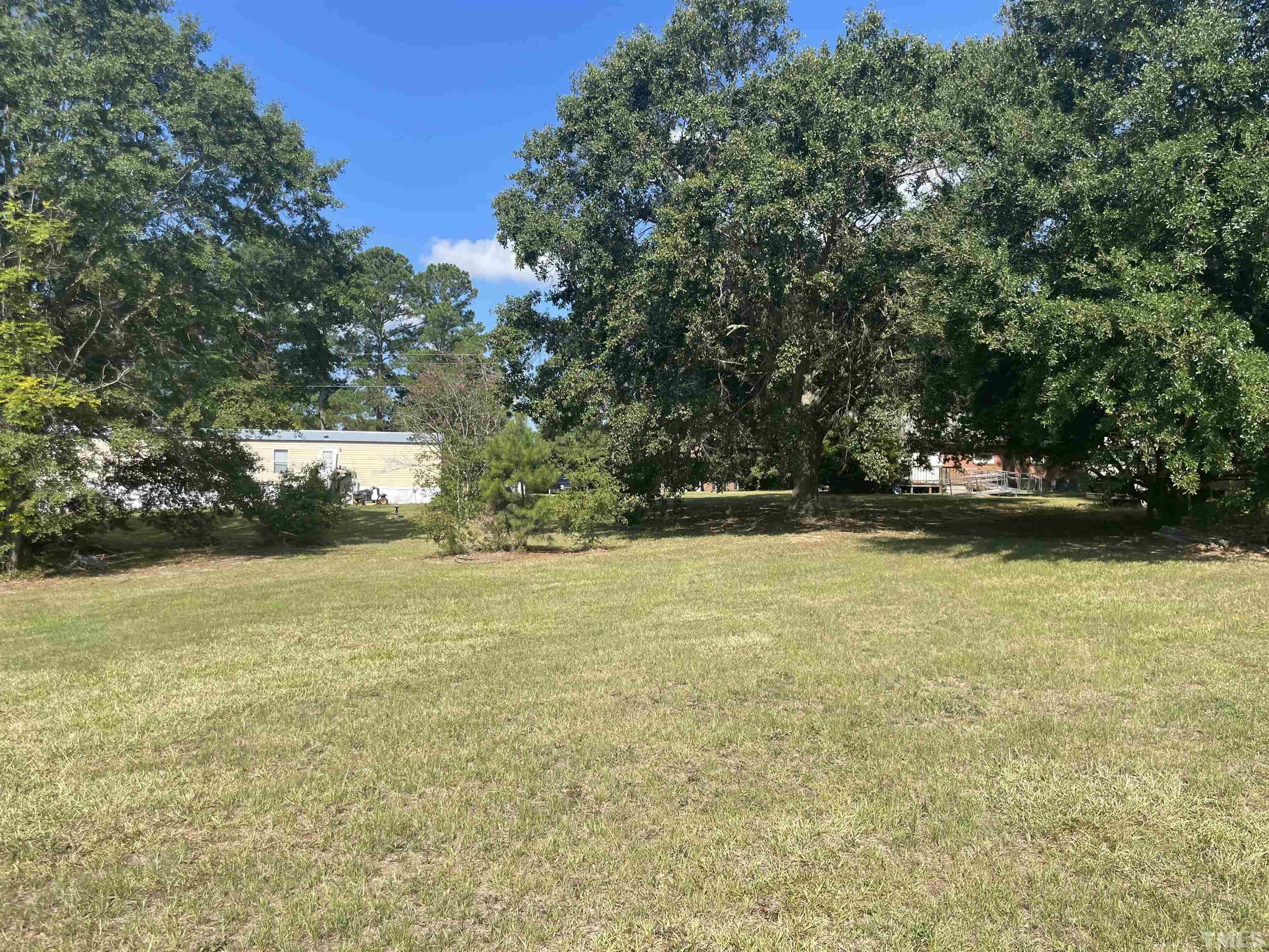 4978 Zacks Mill Road Angier, NC 27501 - Photo 6 of 11 a view of outdoor space and yard