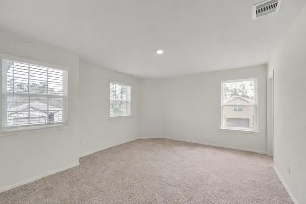 an empty room with windows