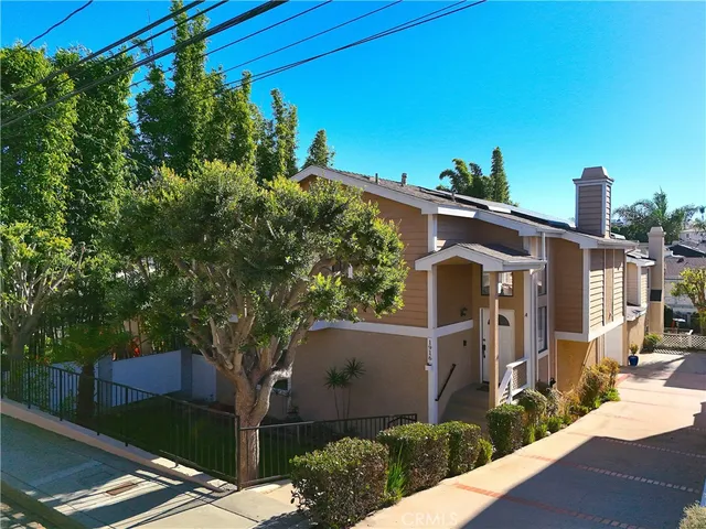 a bedroom with a bed closet and a window