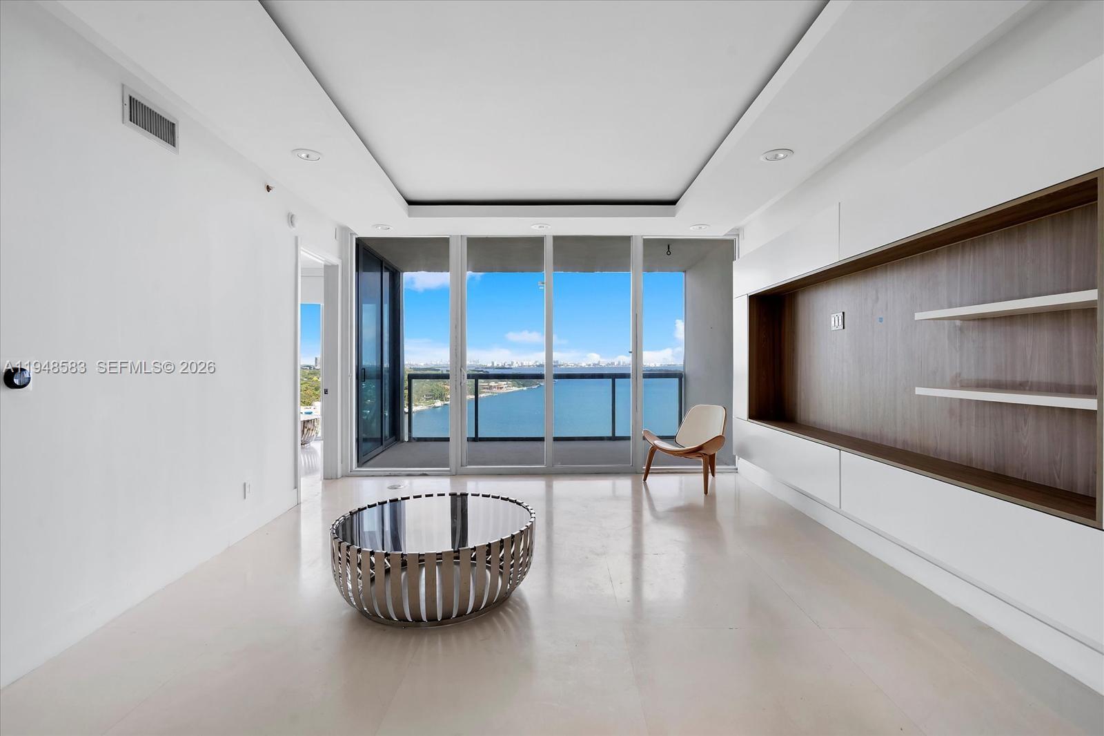 601 Northeast 36th Street, Unit 1310 Miami, FL 33137 - Photo 13 of 40 a view of an empty room with a window