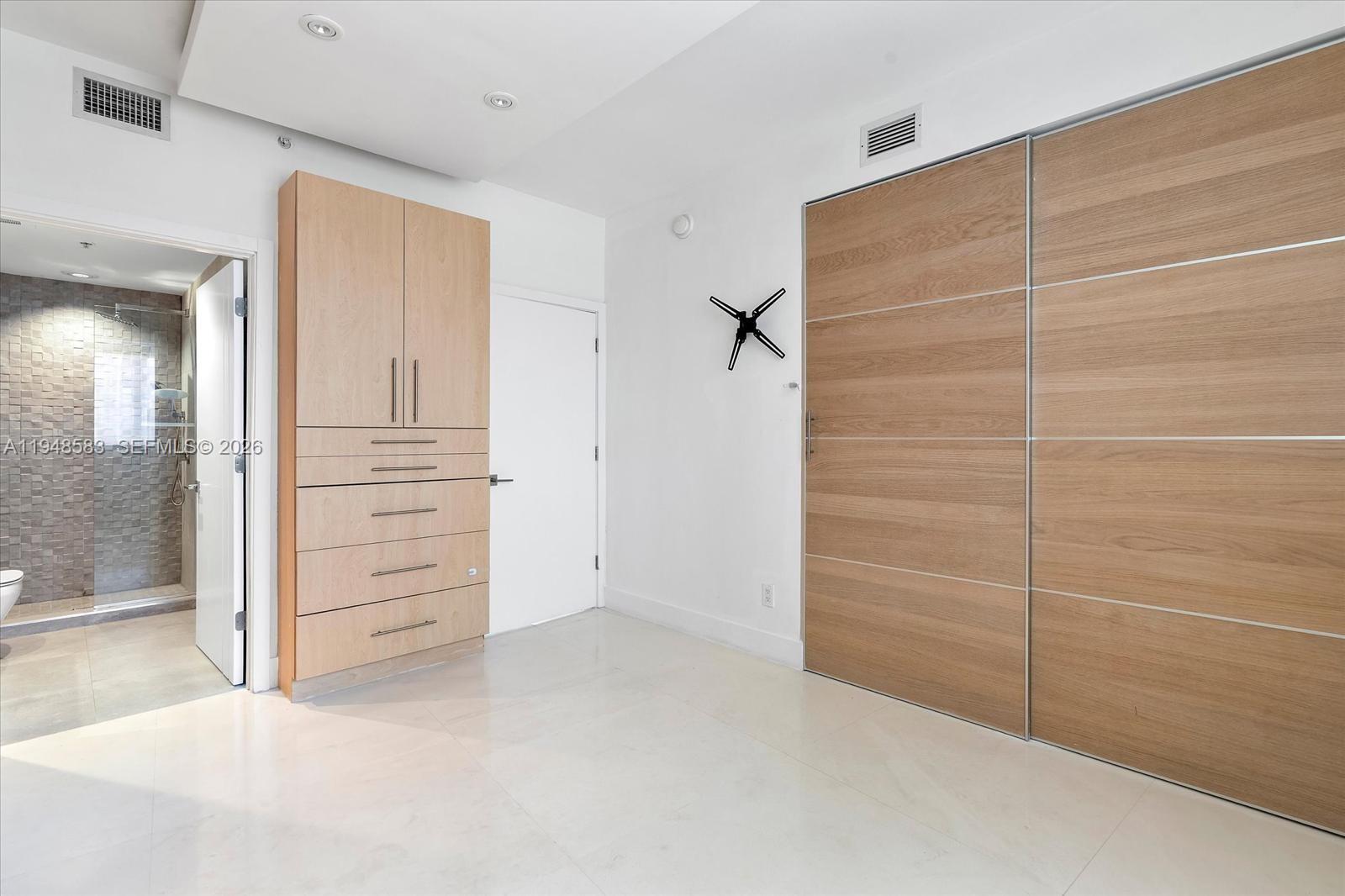 601 Northeast 36th Street, Unit 1310 Miami, FL 33137 - Photo 25 of 40 a view of closet area