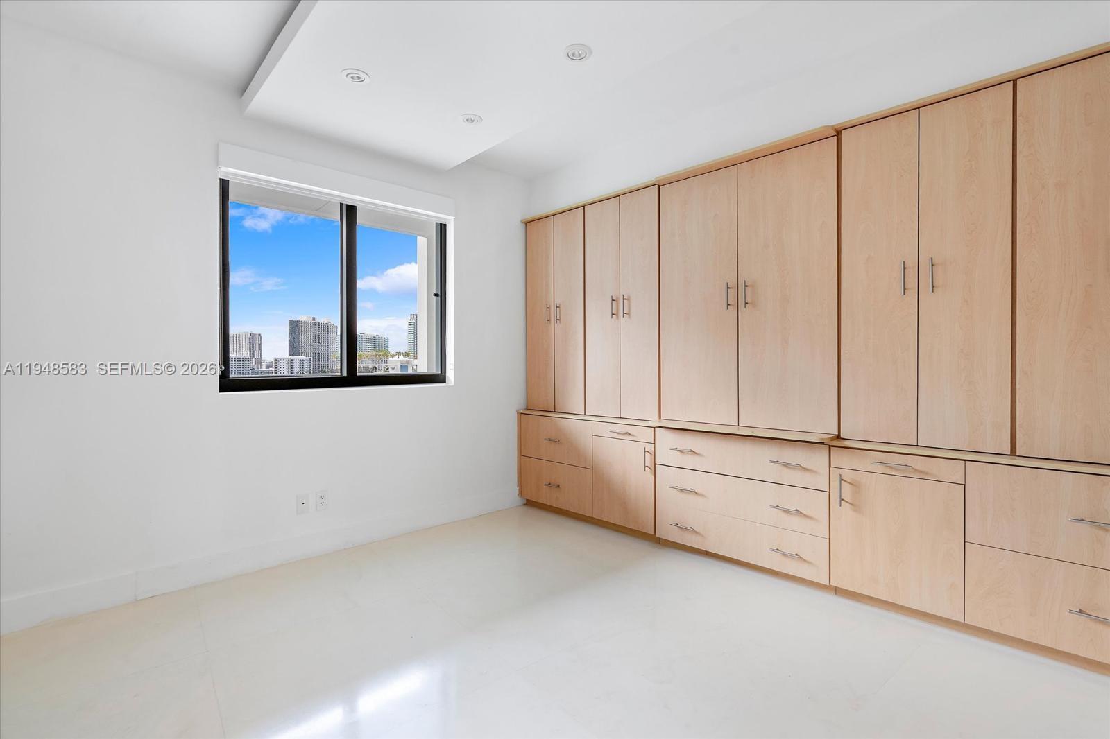 601 Northeast 36th Street, Unit 1310 Miami, FL 33137 - Photo 26 of 40 a view of a livingroom with an empty space