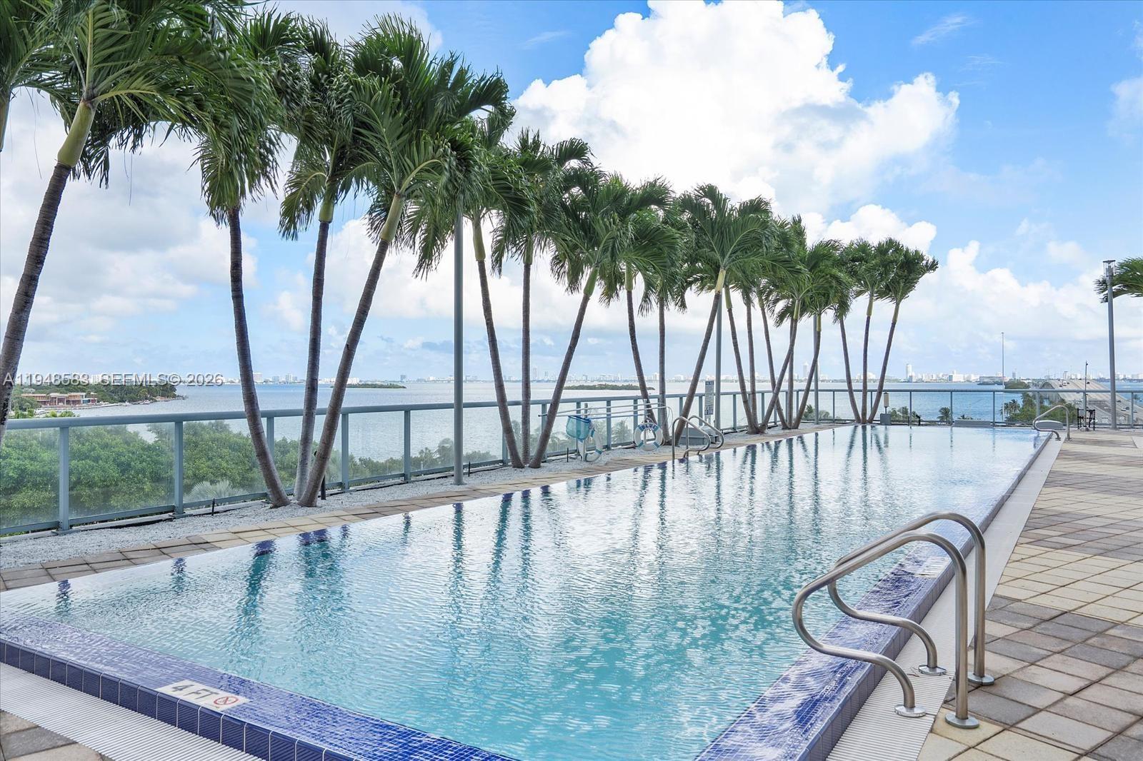 601 Northeast 36th Street, Unit 1310 Miami, FL 33137 - Photo 38 of 40 swimming pool view from a lake view