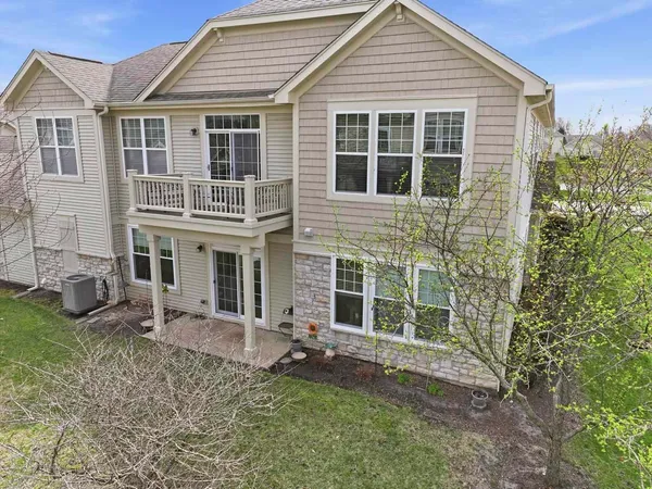 a kitchen with stainless steel appliances granite countertop a stove sink and cabinets