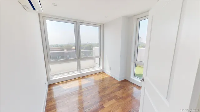 a view of an empty room and window