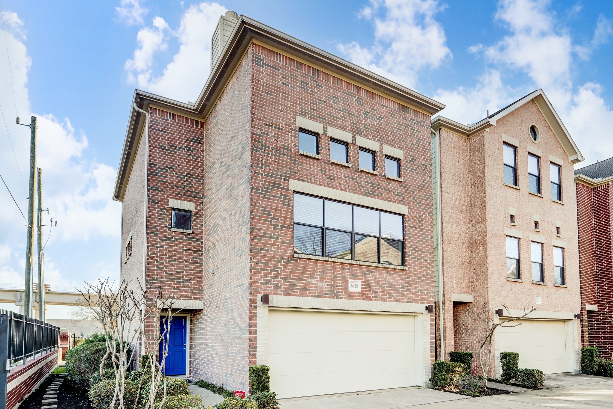 a front view of a building with many windows