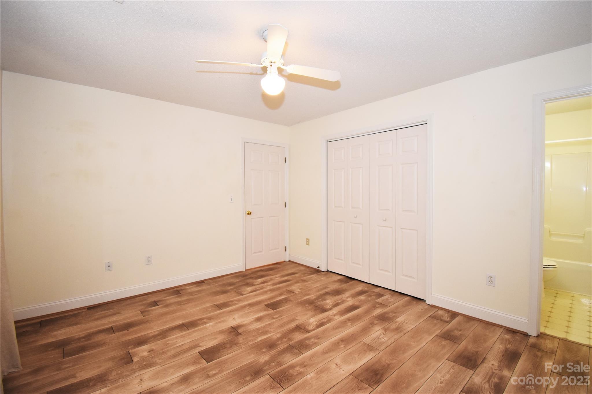 7 Krista Circle, Unit E Candler, NC 28715 - Photo 12 of 24 wooden floor in an empty room