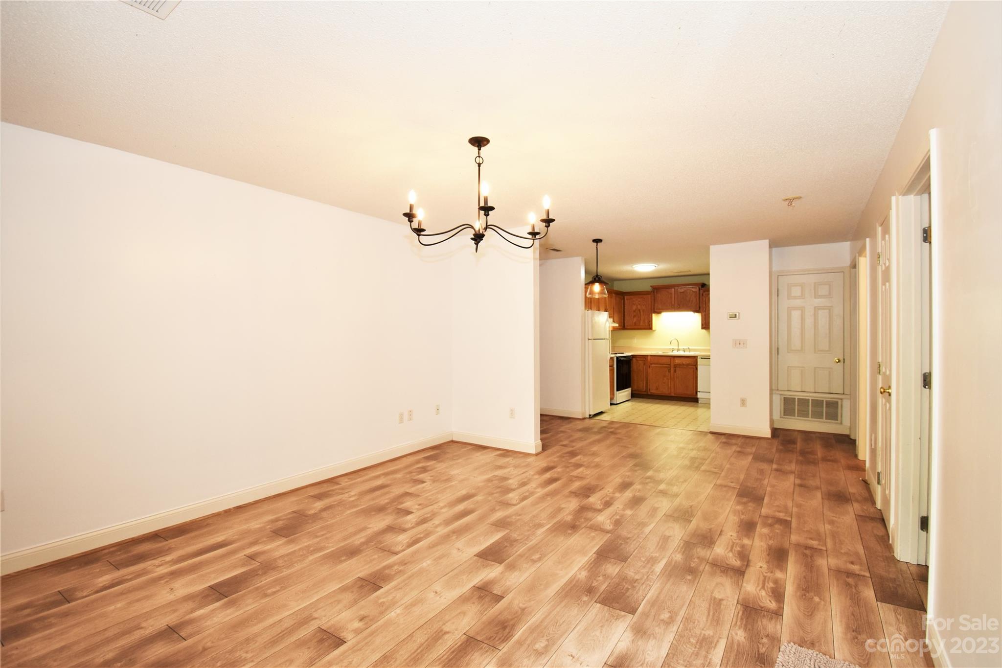 7 Krista Circle, Unit E Candler, NC 28715 - Photo 2 of 24 a view of a kitchen with a sink and a stove