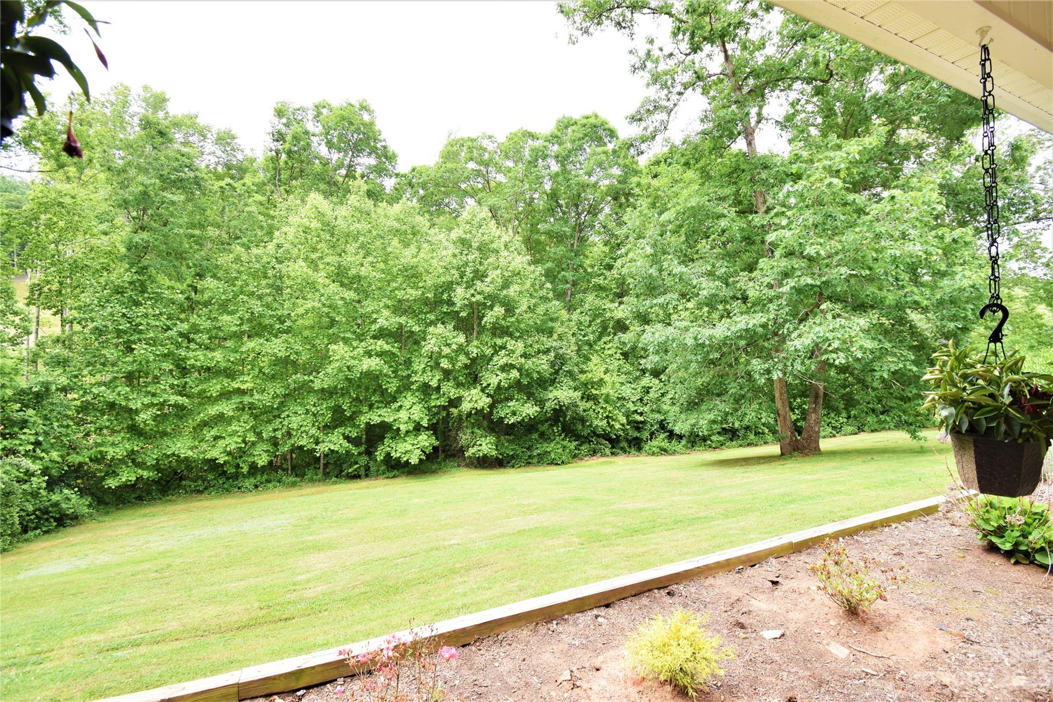 7 Krista Circle, Unit E Candler, NC 28715 - Photo 23 of 24 a view of an outdoor space with a lake view