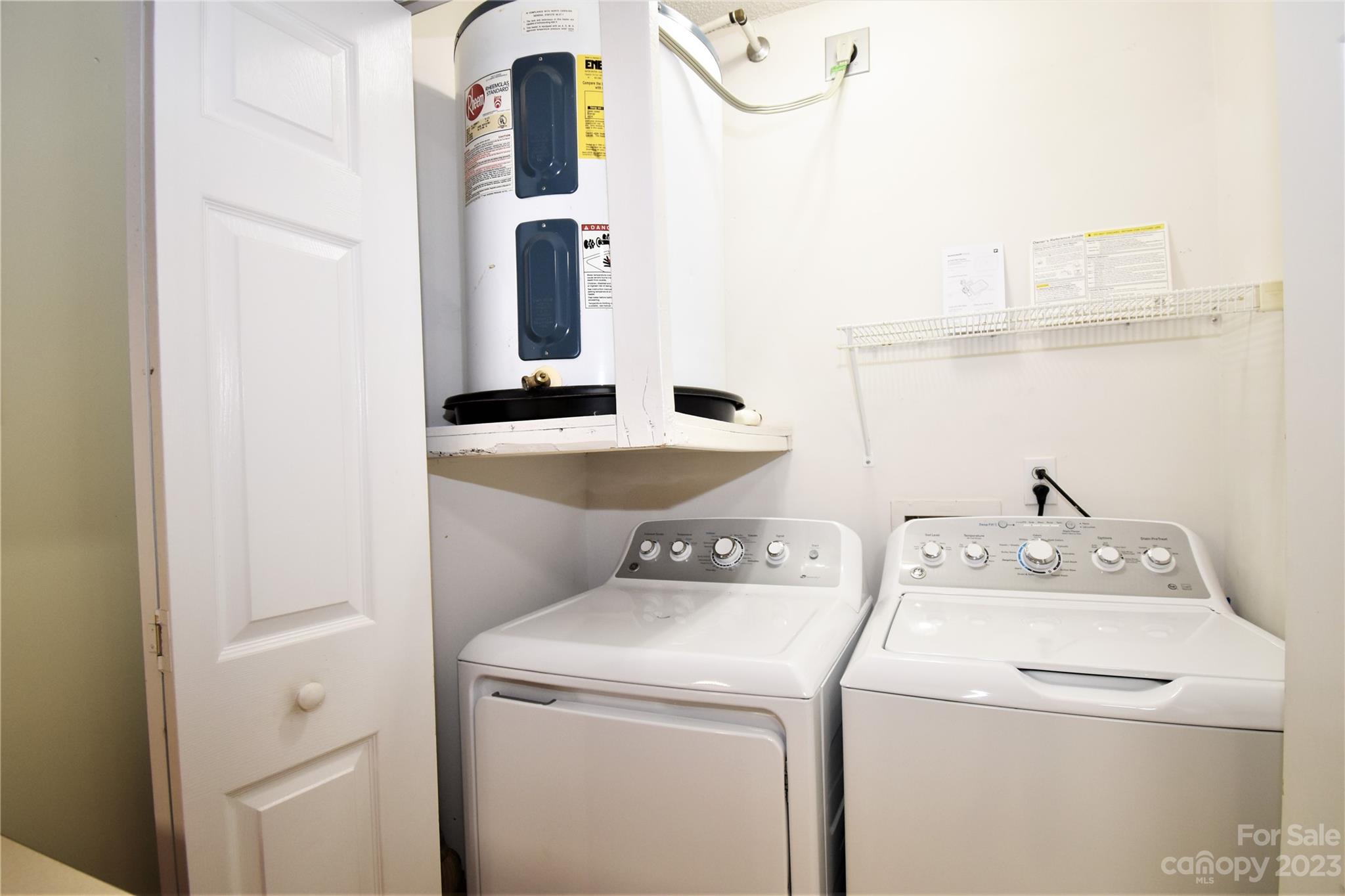 7 Krista Circle, Unit E Candler, NC 28715 - Photo 10 of 24 a utility room with dryer and washer