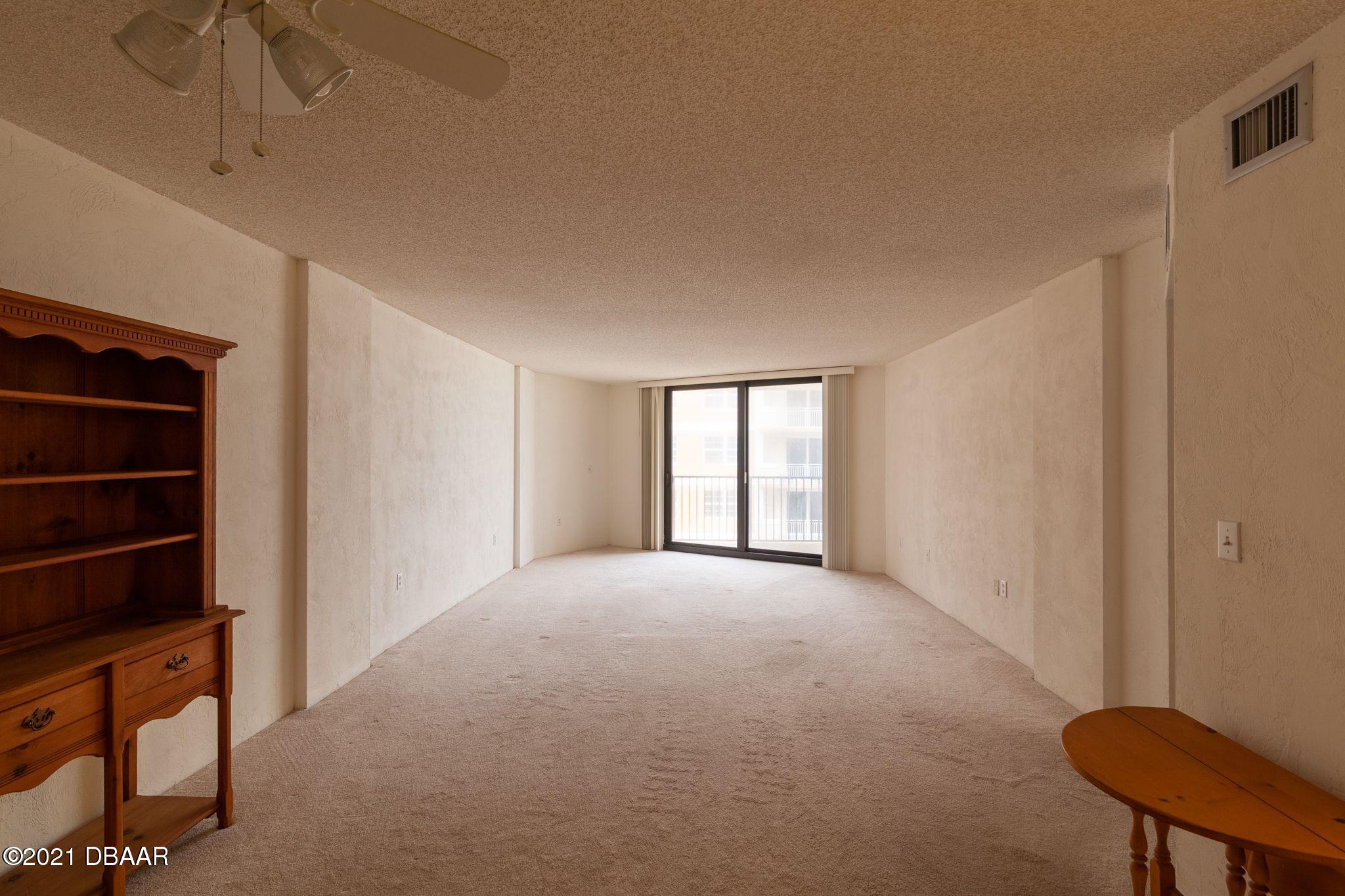 1415 Ocean Shore Boulevard, Unit 903 Ormond Beach, FL 32176 - Photo 15 of 47 a view of empty room with a window