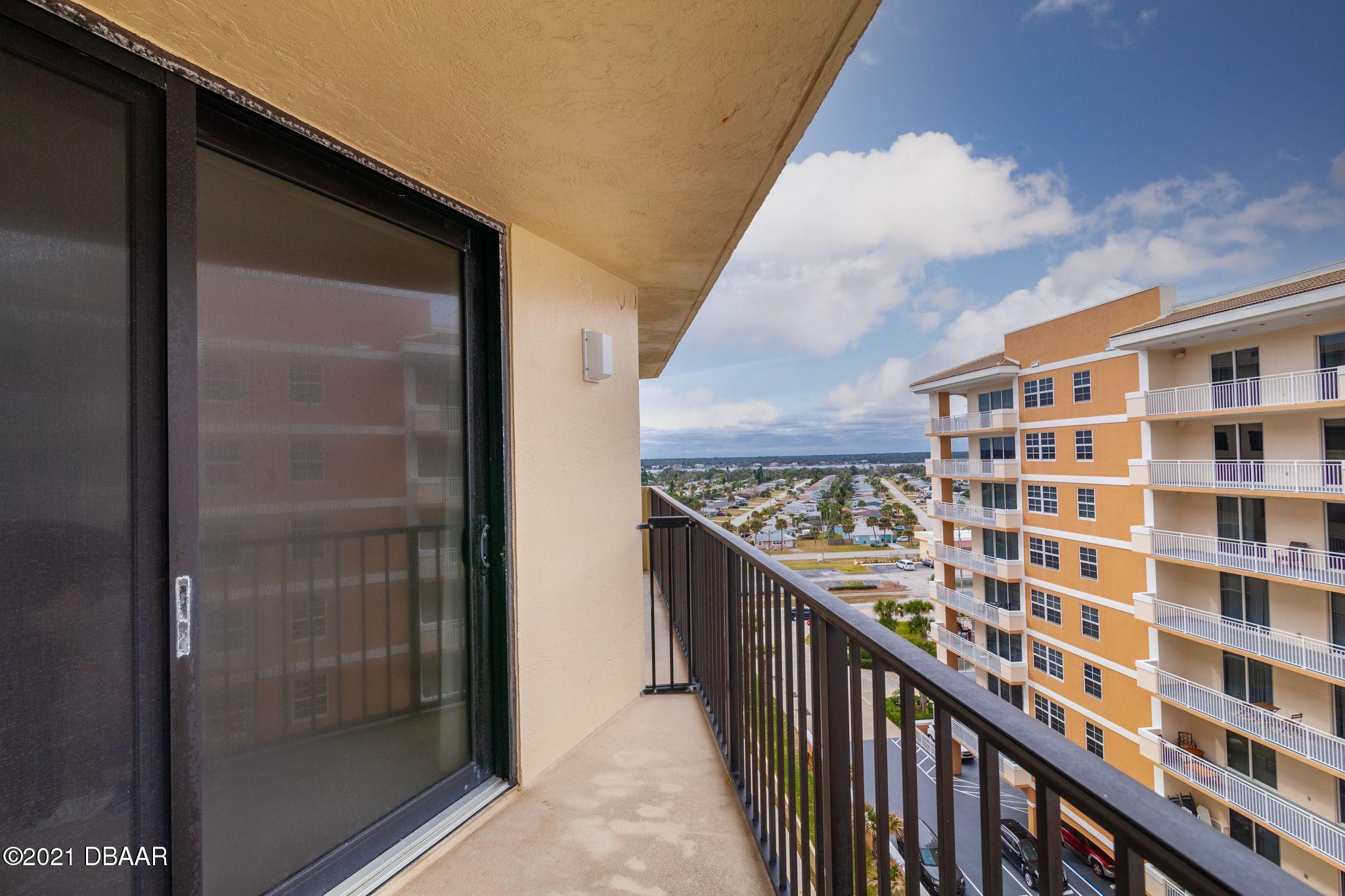 1415 Ocean Shore Boulevard, Unit 903 Ormond Beach, FL 32176 - Photo 2 of 47 a view of city from balcony